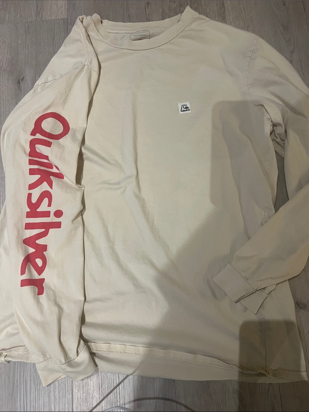 Quiksilver Men’s Cream Long Sleeve Tee with Red Sleeve Script